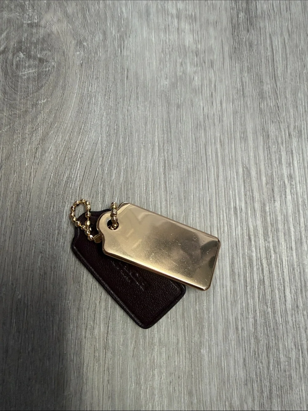 Coach Brown Leather Key Tag with Gold Metal Logo Plate